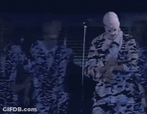 Man With White Mask At Microphone GIF