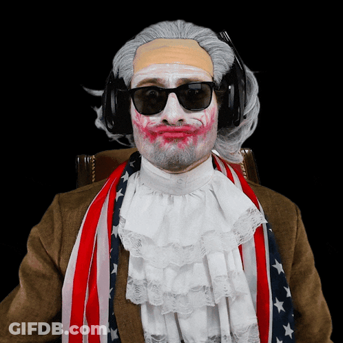 Man With White Paint On Face Wearing Headphones And American Flag Scarf GIF