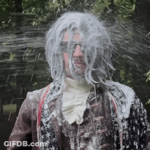 Man With Wig And Sunglasses Covered In Soap GIF