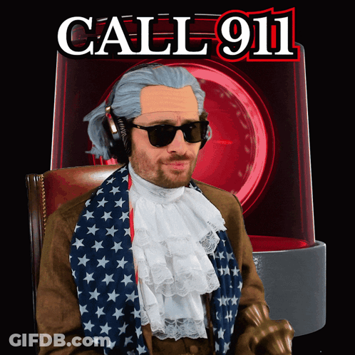 Man With Wig And Sunglasses In Front Of Call 911 Sign GIF