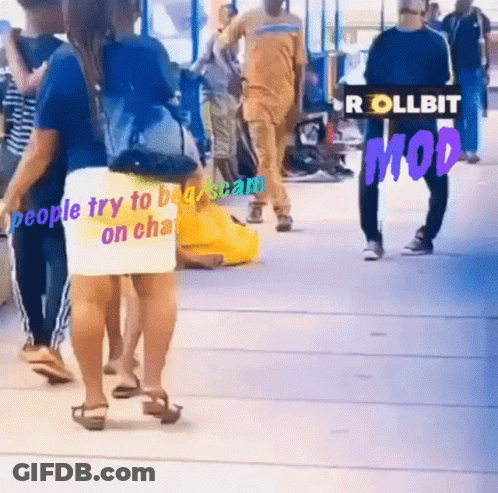 Man With Wig And Sunglasses Kneeling Down Rio De Janeiro GIF
