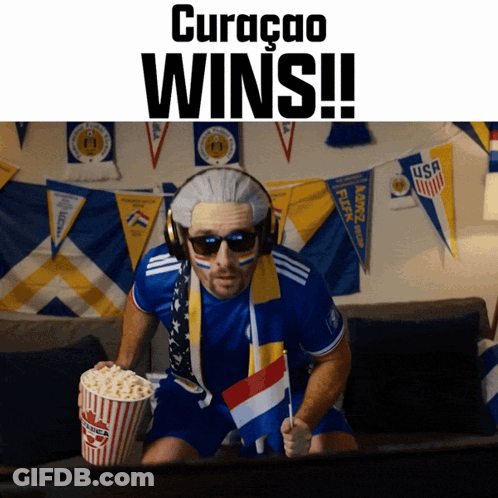 Man With Wig Holding Popcorn Bucket Curaçao Wins GIF