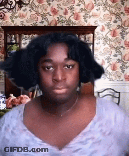 Man With Wig Making Funny Face Flower Wall GIF