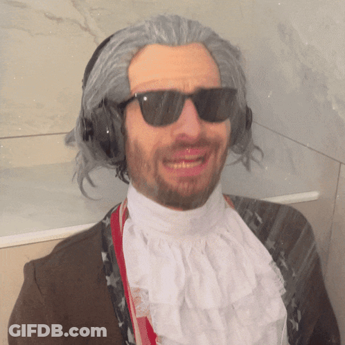 Man With Wig, Sunglasses, And Headphones GIF