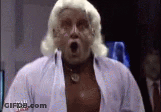 Man With Wig Wearing White W Shirt GIF