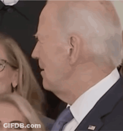 Man With Woman Behind Him GIF