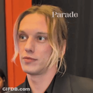 Man With Word Parade Above Him GIF