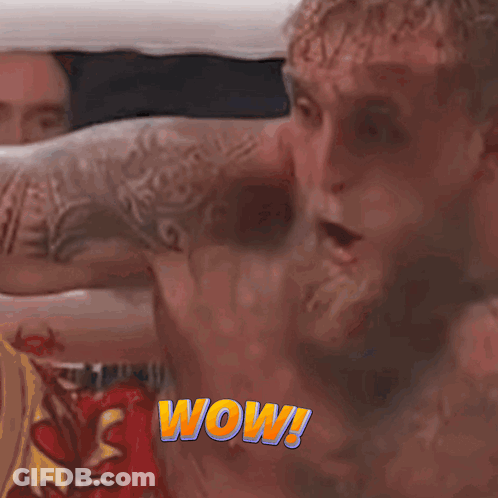 Man With Wow Tattoo On Chest GIF