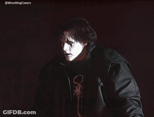 Man With Wrestling Covers GIF