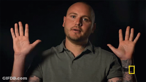 Man With Wrist Tattoo Hands In Air GIF