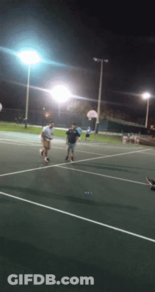 Man With Yellow Shorts Dunk GIF
