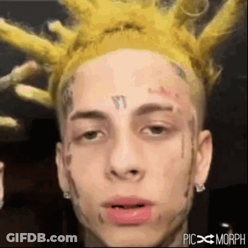 Man With Yellow Wig Close Up GIF