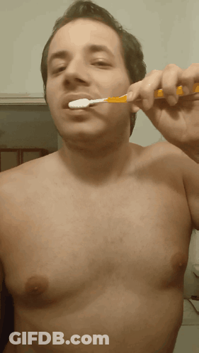 Man Without Shirt Brushing Teeth GIF