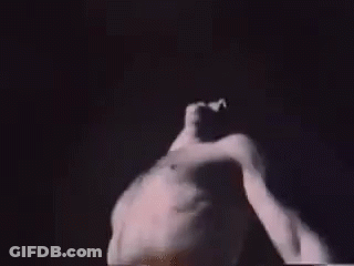 Man Without Shirt Dancing In Dark GIF