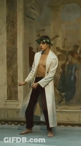 Man Without Shirt Dancing In Front Of Painting GIF