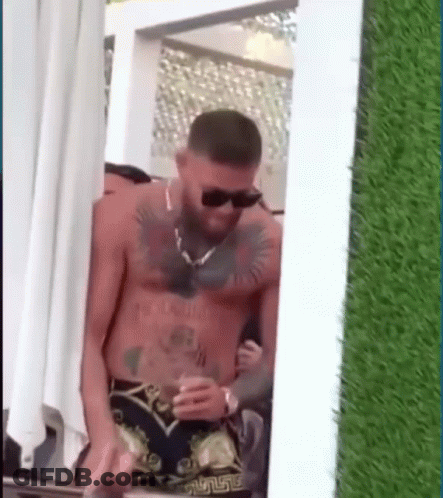 Man Without Shirt Holding Beer GIF