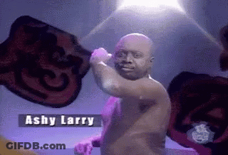 Man Without Shirt Holding Purple Object Ashy Larry GIF
