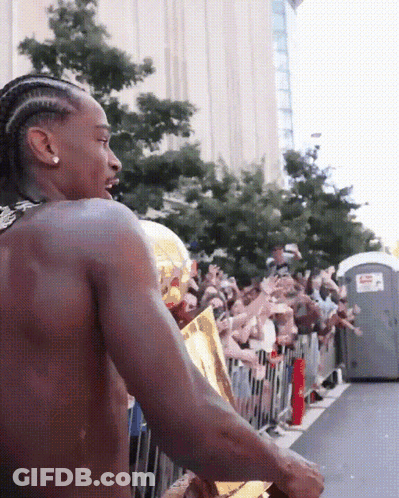 Man Without Shirt Holding Trophy GIF