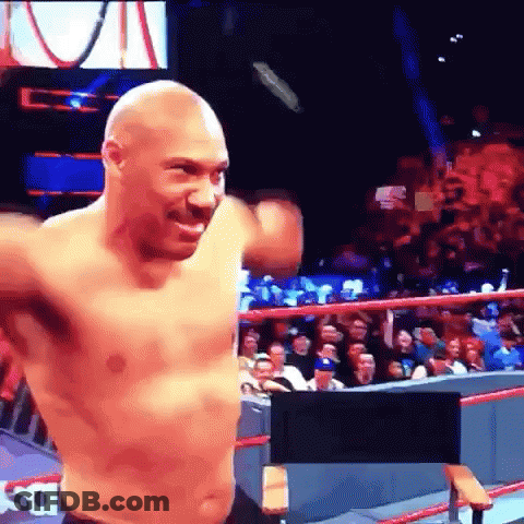 Man Without Shirt In Boxing Ring With Crowd GIF