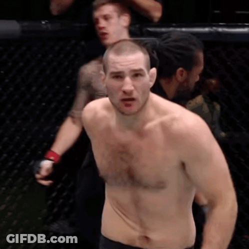 Man Without Shirt In Cage GIF