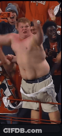Man Without Shirt In Crowd Saying Add Comment GIF