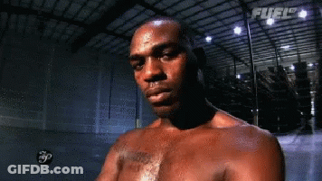 Man Without Shirt In Dark Room Fuel Ceiling GIF