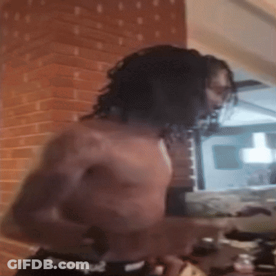 Man Without Shirt In Front Of Brick Wall Kitchen GIF