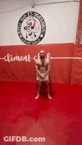 Man Without Shirt In Front Of Clement Club GIF