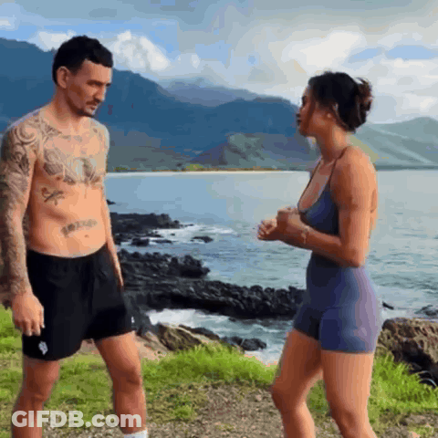 Man Without Shirt Next To Woman In Blue Tank Top GIF