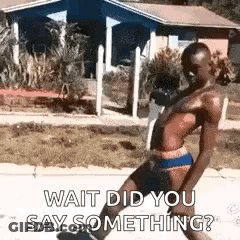 Man Without Shirt On Sidewalk GIF