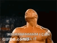 Man Without Shirt Smelling GIF