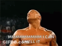 Man Without Shirt Smelling GIF