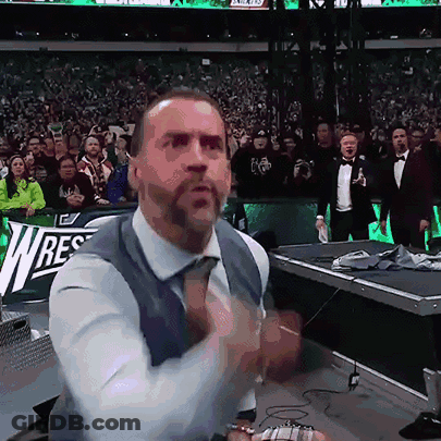 Man Without Shirt Standing In Dark Room GIF