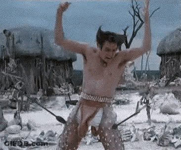 Man Without Shirt Standing In Field GIF
