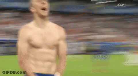 Man Without Shirt Standing On Soccer Field GIF