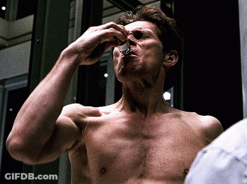 Man Without Shirt Taking Pill GIF