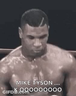 Man Without Shirt Talking To Mike Tyson GIF