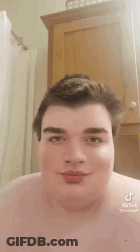 Man Without Shirt With TikTok On Chest GIF
