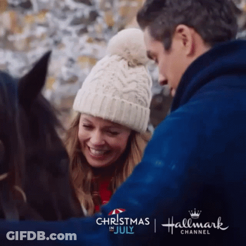 Man Woman With Horses Hallmark Christmas July Ad GIF