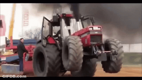 Man Working On Smoking Tractor GIF
