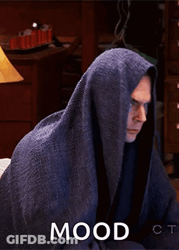 Man Wrapped In Blanket With Mood GIF