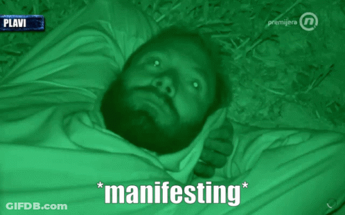 Man Wrapped In Green Blanket Manifesting GIF