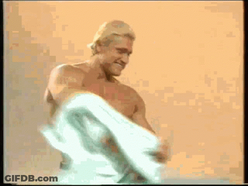 Man Wrapped In Towel Smiling GIF