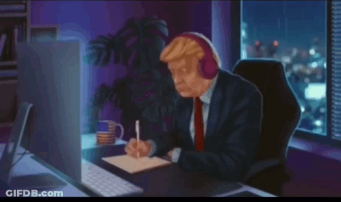 Man Writing At Computer With Headphones GIF