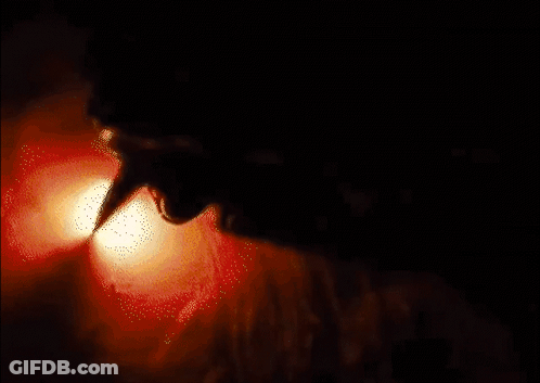 Man Writing Fire Igniting On Paper GIF
