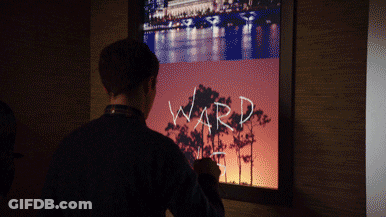 Man Writing Name Ward On Screen GIF