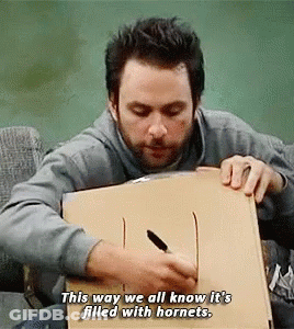 Man Writing On Box This Way We All Know It's Filled With Hornets GIF
