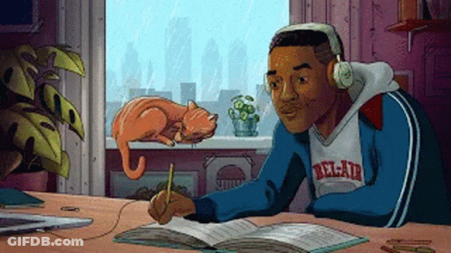 Man Writing With Headphones Cat Sleeping On Window Sill GIF