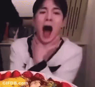 Man Yawning At Plate Of Food GIF