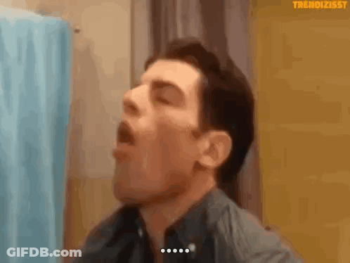 Man Yawning In Front Of Mirror GIF